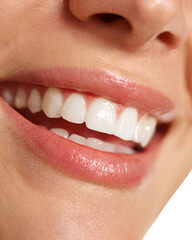 Obraz premium Close up of a woman s healthy white teeth and smiling lips with natural light