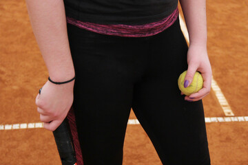 Female Tennis Player Ready to Serve &ndash; Focus and Determination on Clay Court