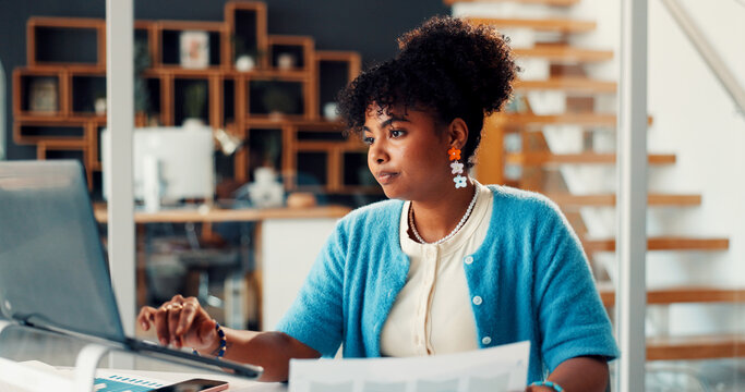 African woman, laptop and document at house for research, finance report and data analysis. Female person, remote work and typing on pc with financial paperwork, revenue graphs and audit information - Powered by Adobe