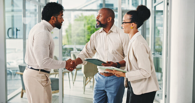 Business people, handshake and happy with tablet, recruitment and welcome with team at office. Men, woman and excited with shaking hands, tech and congratulations for hiring at human resources agency