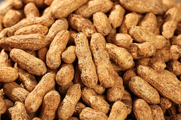 Fresh Raw Peanuts in Shell - Natural Brown Textured Nuts Background Photo