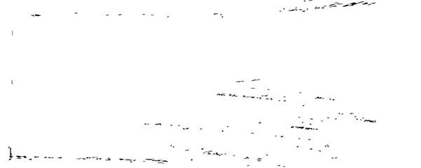 Abstract black ink splatters and drips on a stark white background creating a chaotic yet artistic texture