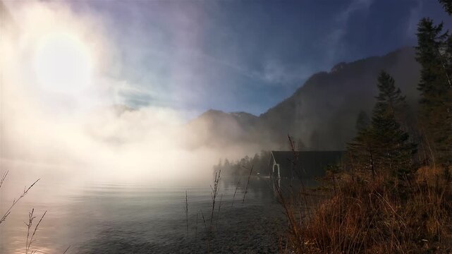 Foggy sunrise at lake Konigsee, in the Bavarian Alps, Germany
