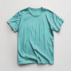 Fototapeta premium A Light Blue T-Shirt on a White Background