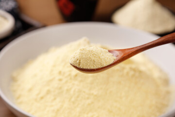 Fresh Glutinous Rice Flour on Wooden Spoon - Asian Cooking Ingredient