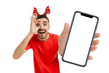 Young man in antler headband with smartphone, isolated, PNG