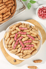 Fresh Raw Peanuts in Shell and Skinned Red Peanuts on Wooden Board - Healthy Snack Food Photography