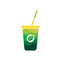Green smoothie in a yellow cup with a straw represents healthy eating and a sustainable lifestyle choice.