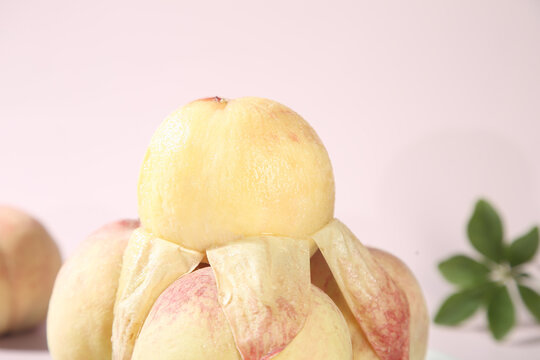 Fresh Yangshan Peaches Peeled and Sliced on White Background - Premium Chinese Fruit