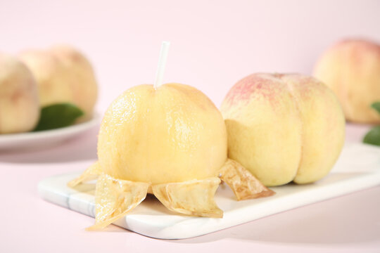 Fresh Yangshan Peaches on White Plate - Ripe Stone Fruit Ready to Eat