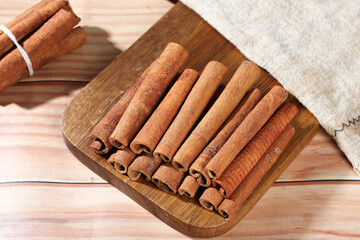 Guangxi Cinnamon Bark Sticks Natural Spice Seasoning on Wooden Board