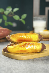 Golden Honey Glazed Roasted Sweet Potatoes on Wooden Board - Healthy Comfort Food Dish