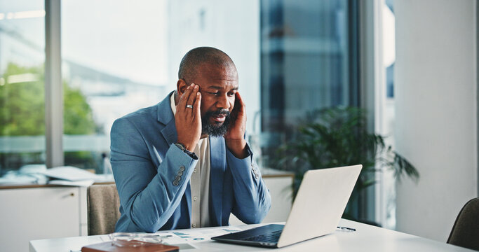Stress, headache and black man in office with laptop for stock market crisis with investment. Computer, migraine and African male financial manager with burnout for finance report in workplace. - Powered by Adobe