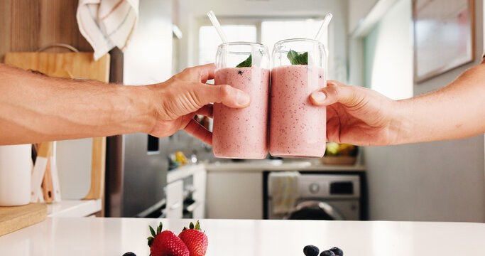 Smoothie, toast or hands in kitchen with fruit drink, organic nutrition or antioxidant benefits. People, strawberry or protein shake cheers in home for digestive health, morning beverage or hydration