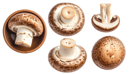 Group of whole, sliced brown mushrooms on black