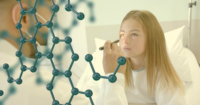 Examining child on clinic exam bed, doc in white coat holding penlight, molecular model, copy space - Powered by Adobe