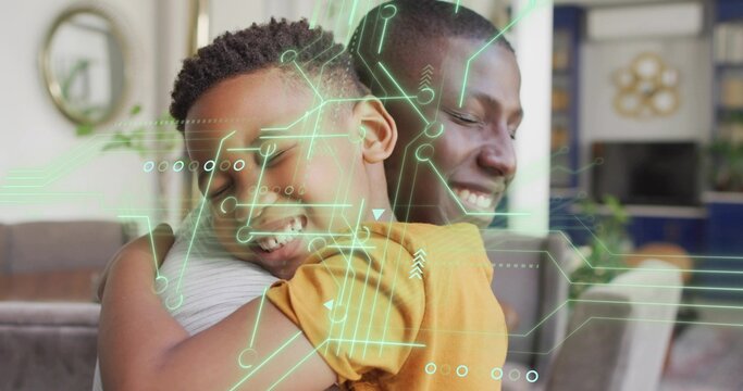 Hugging father and son sharing embrace at home on sofa, child in mustard top, AR overlay