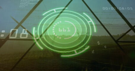 Displaying neon green HUD overlaying farmland at dusk, with pylons, geometric frame, timecode