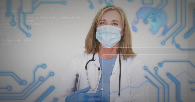 Standing doctor wearing mask blue gloves, coat over scrubs, stethoscope hanging with HUD in clinic - Powered by Adobe