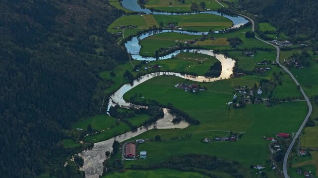 River bends through farmlands and valleys close to Stryn, Norway