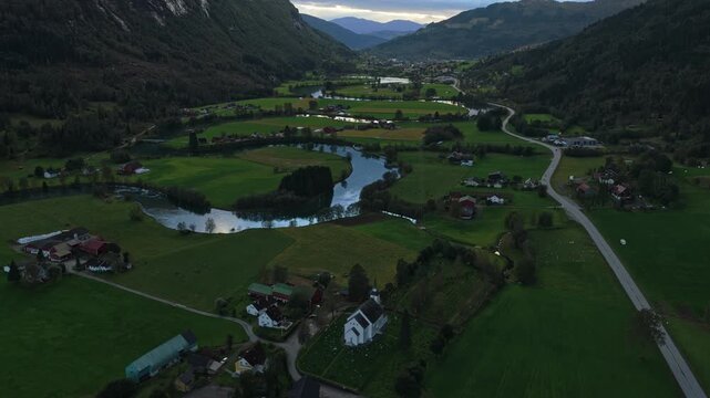 Aerial panorama of Stryn countryside with winding river and meadows