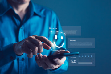 Customer giving five-star rating with smiley face on mobile phone, concept of positive user feedback, satisfaction, online review, digital experience