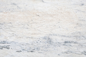 Natural textured surface with light colors and subtle patterns in a warm tone