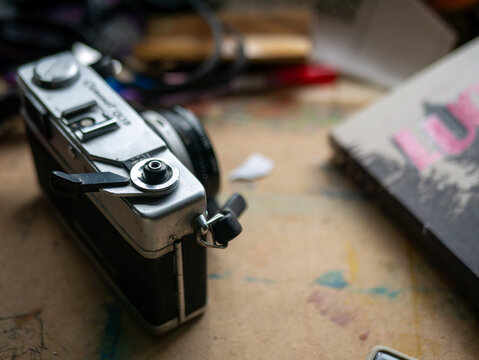 Vintage Film Camera Shutter Button and Rewind Crank Close-Up Detail on Classic Photography Equipment