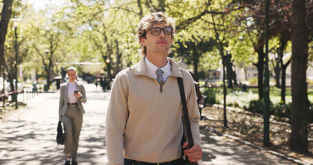 Vision, walking and business man in park for reflection, memory and thinking on journey. Pride, commute and opportunity with person and idea outdoor for mindset, professional development and peace