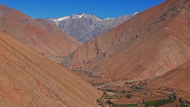 Panoramic aerial view of the mountains of the Elqui Valley in northern Chile during the dry winter season, on a sunny and clear day.