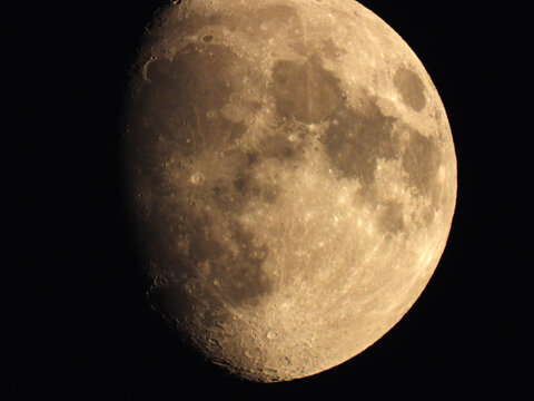 moon in waxing gibbous phase in the dark sky