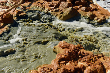 Toxic gold mining residual waters from gold mine flowing and polluting environment