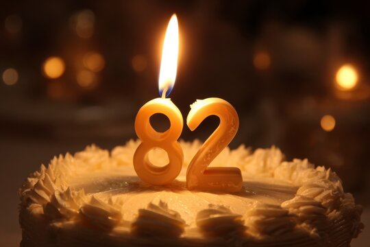 Celebratory Cake with Number 82 Candle for Special Birthday Event