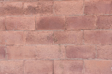 Red brick wall as background, closeup