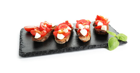 Tasty bruschettas with tomatoes, mozzarella cheese and basil isolated on white