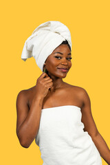 Woman doing self-care routine with jade roller