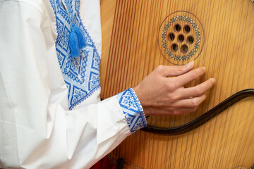 Bandura is a Ukrainian folk stringed plucked musical instrument. A classical (diatonic) and modern (diatonic or chromatic) instrument from the harp, gusel, and psaltery family.