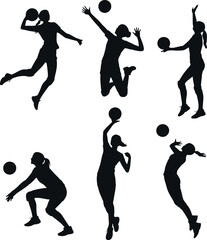 Volleyball players silhouettes in action