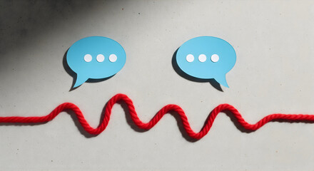 Connect with customers through captivating conversations showing two speech bubbles linked by a vibrant red thread for marketing & advertising campaigns