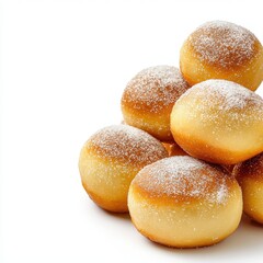 Freshly baked round doughnuts with a golden brown exterior covered in fine sugar granules and stacked on a white background for dessert or snack presentation