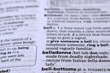 Obraz premium Close Up Of English Dictionary Page With Word - belladonna