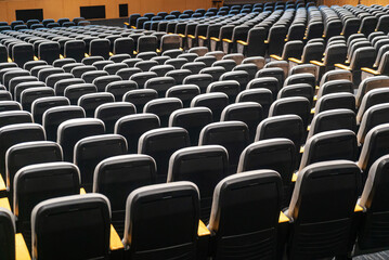 Naklejka premium Empty theater seats in a vacant hall