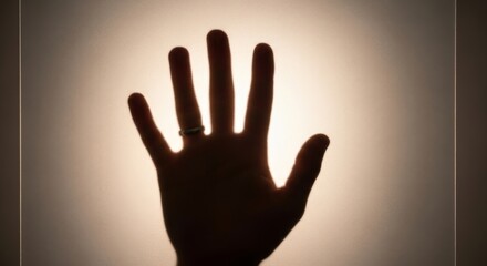 Hand Pressed Against Frosted Glass, Close-Up Minimalist Photo with Soft Lighting and Natural Skin Tones