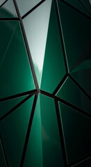 Close-up of glossy dark-green geometric paneling with black seams, creating an angular, faceted surface, representative of futuristic design or modern art