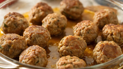 Homemade meatballs simmered in rich sauce ready to serve family dinners or tasty appetizers now