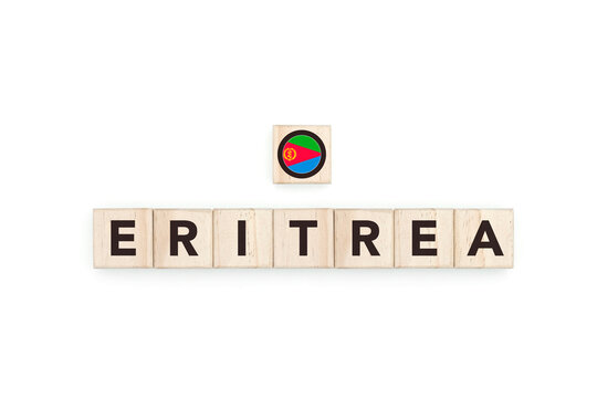 Wooden blocks bearing the name and flag of Eritrea. Eritrean and African Culture, national identity, travel, and geography in a copy space design.