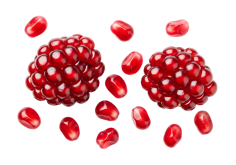 Fresh ripe pomegranate arils on a clean background, vibrant red fruit seeds isolated.