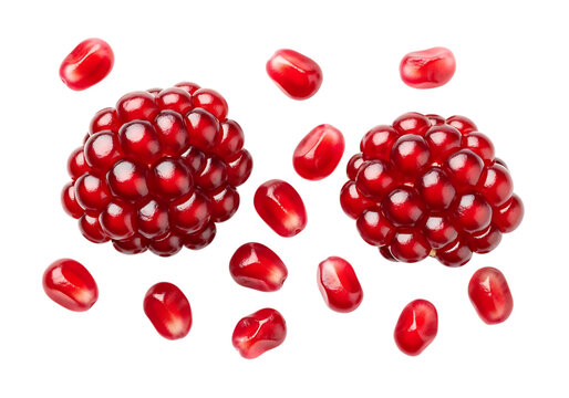 Fresh ripe pomegranate arils on a clean background, vibrant red fruit seeds isolated.