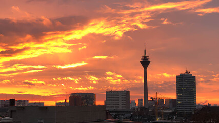 Duesseldorf Skyline in a fantastic Sundown - Sahara Dust turns the Sky into great colours. High quality photo