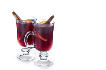 Mulled Wine with Orange and Cinnamon Sticks isolated on white background. Copy space